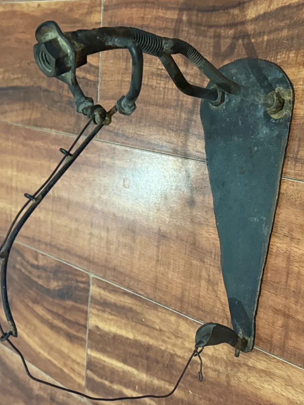 Industrial scrap metal sculpture fishing motif